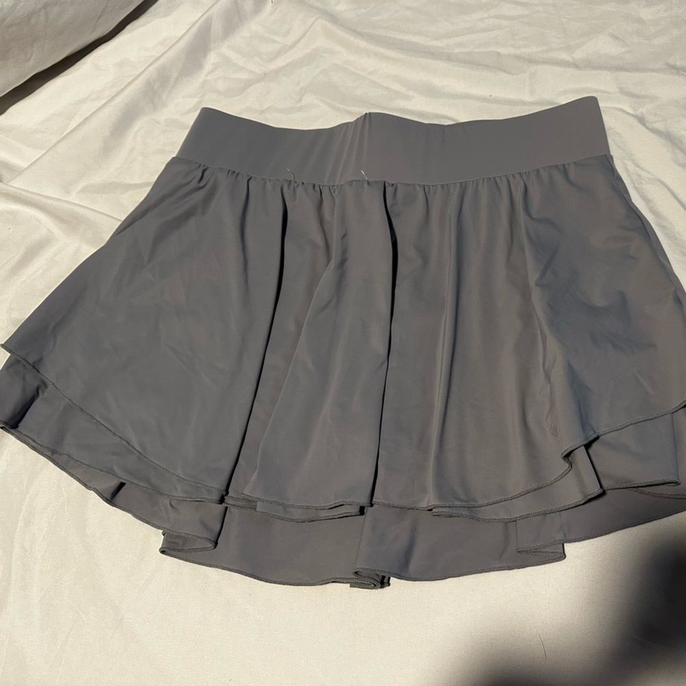 Light purple golf squort with phone pocket